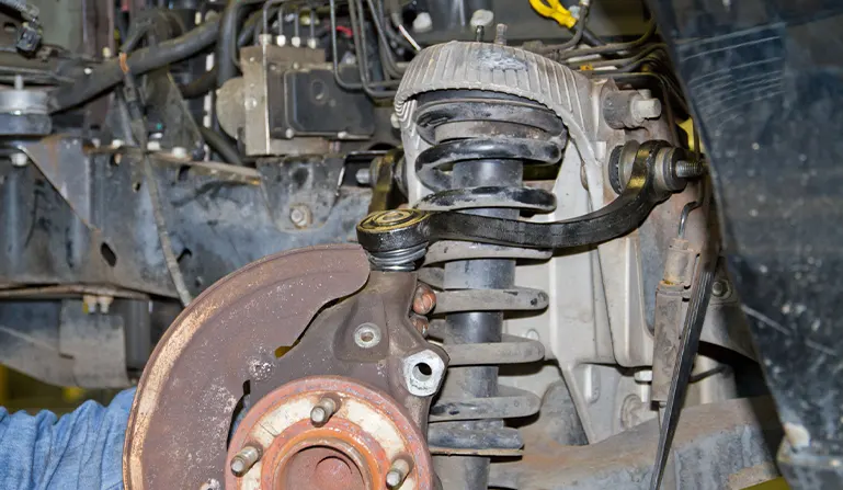 Replaced control arm in a car